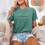 He’s Playing Basketball – Funny Sports Girlfriend Comfort Color Shirt for Women